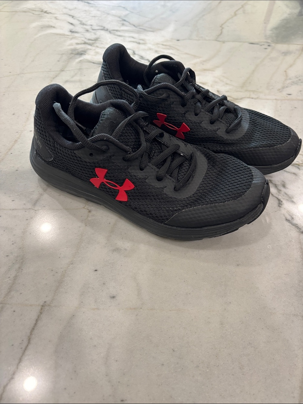 Under Armour Kids Black Sneakers with Red Logo